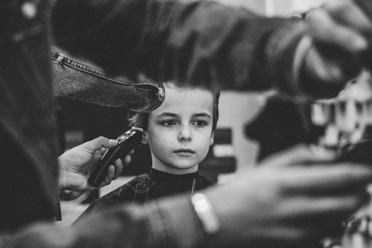 Side profile of model showcasing dramatic hair spikes achieved through avant-garde cuts